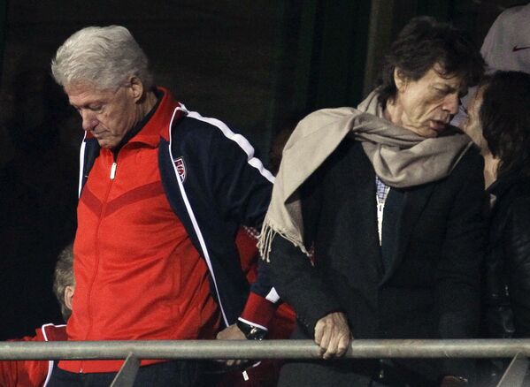 Bill Clinton y Mick Jagger en la Copa del Mundo 2010 - Sputnik Mundo