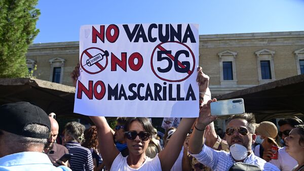 Manifestación de negacionistas del coronavirus en Madrid - Sputnik Mundo