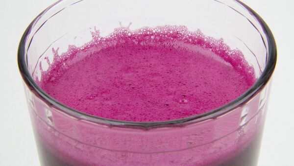 Una bebida de color violeta. Imagen referencial - Sputnik Mundo