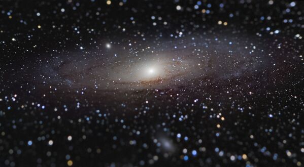 La foto 'Andromeda Galaxy at Arm's Length' ('la galaxia de Andrómeda al alcance de la mano'), de Nicolas Lefaudeux (Francia), ganador del concurso.
 - Sputnik Mundo