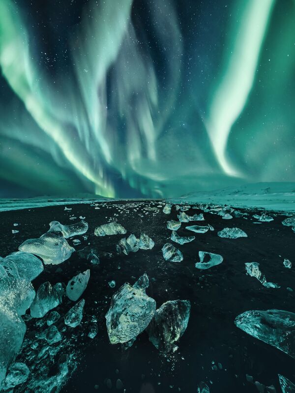 La instantánea 'Iceland' ('Islandia'), de la fotógrafa rusa Kristina Makeeva, de la categoría 'Aurorae'. 
 - Sputnik Mundo
