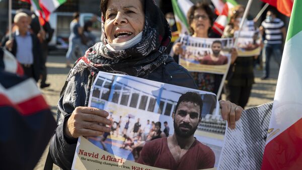 Una manifestación contra la ejecución del luchador Navid Afkari - Sputnik Mundo