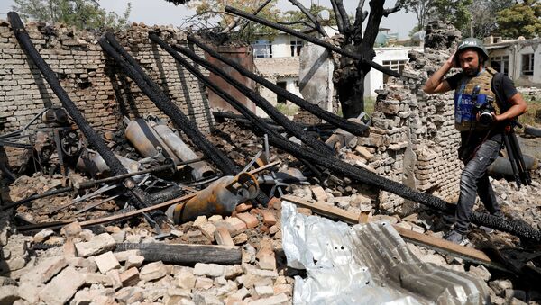 Unperiodista en el lugar de la explosión en Kabul (archivo) - Sputnik Mundo