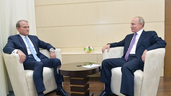 El presidente de Rusia, Vladímir Putin, y el líder del partido ucraniano, Víctor Medvedchuk - Sputnik Mundo