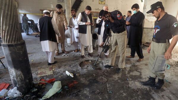 Consecuenias de una explosión en una madrasa pakistaní - Sputnik Mundo