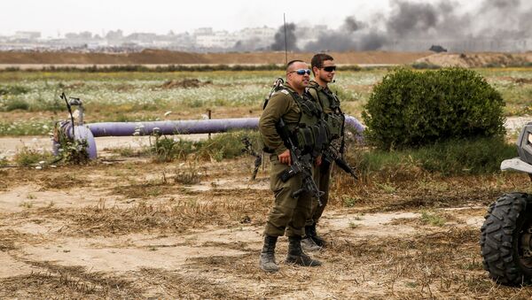Soldados israelíes en la frontera con la Franja de Gaza - Sputnik Mundo