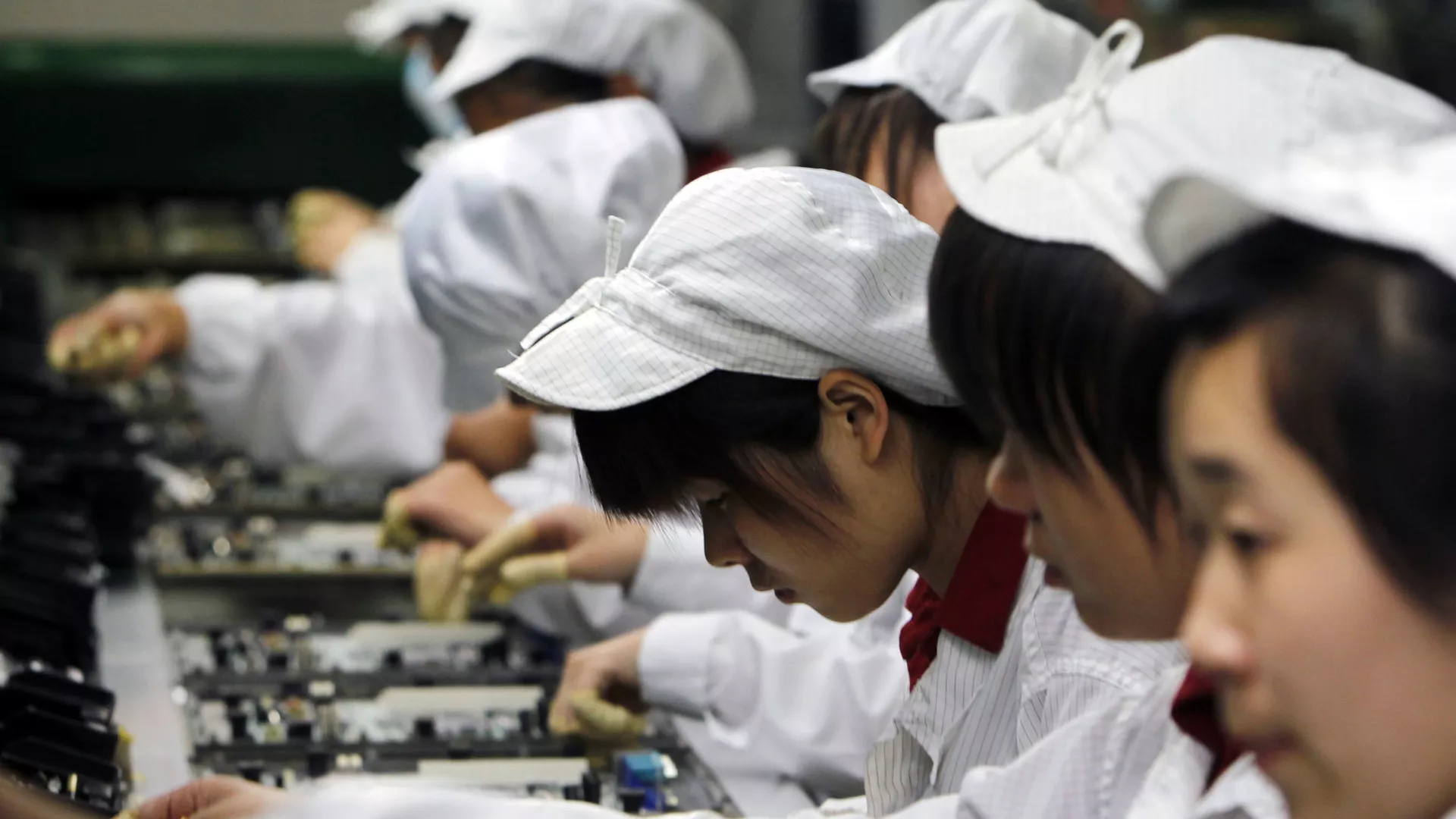 Trabajadores de la fábrica Foxconn en China (archivo) - Sputnik Mundo, 1920, 02.07.2024