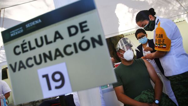 México comienza la vacunación contra COVID-19 - Sputnik Mundo