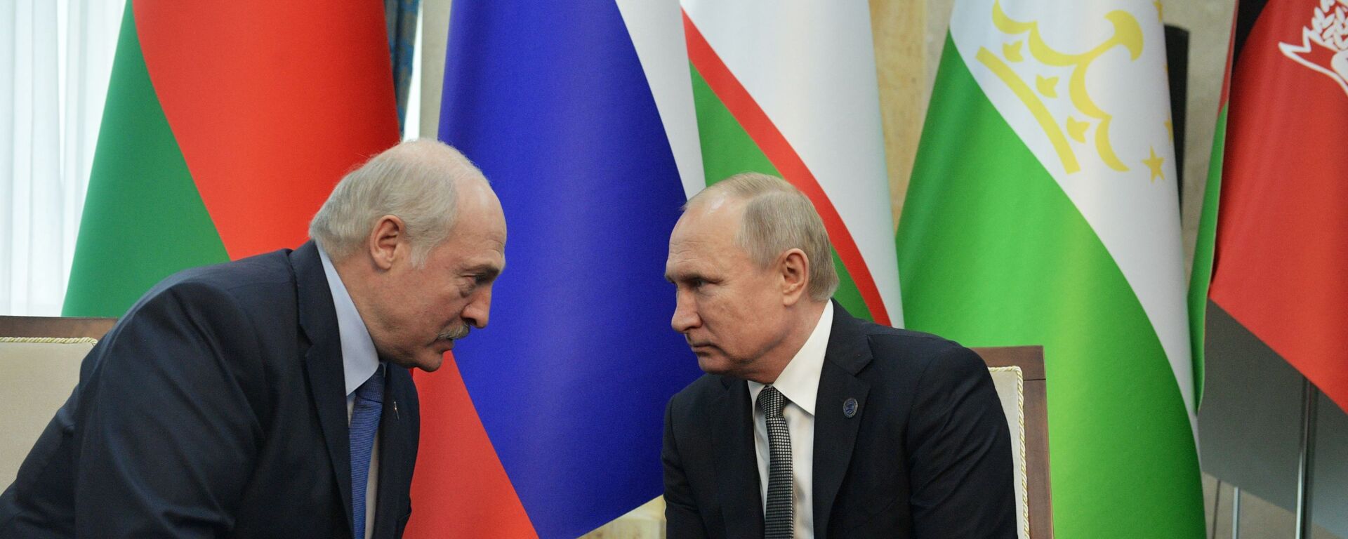 Alexandr Lukashenko, presidente de Bielorrusia, y Vladímir Putin, presidente de Rusia - Sputnik Mundo, 1920, 03.05.2022