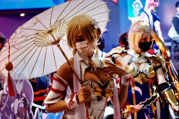 Una fan de 'cosplay' en la feria de 'gamers' Taipei Game Show en Taiwán.  - Sputnik Mundo