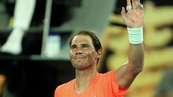 Rafa Nadal tras vencer a Michel Mmoh en el Open de Australia - Sputnik Mundo