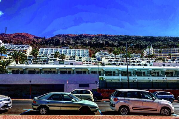 Hoteles de Puerto Rico, al sur de Gran Canarias, una de las zonas turísticas por excelencia y con más hoteles de acogida de inmigrantes - Sputnik Mundo
