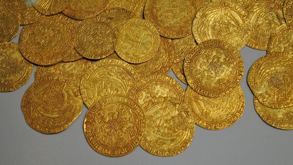 Monedas de oro (imagen referencial) - Sputnik Mundo