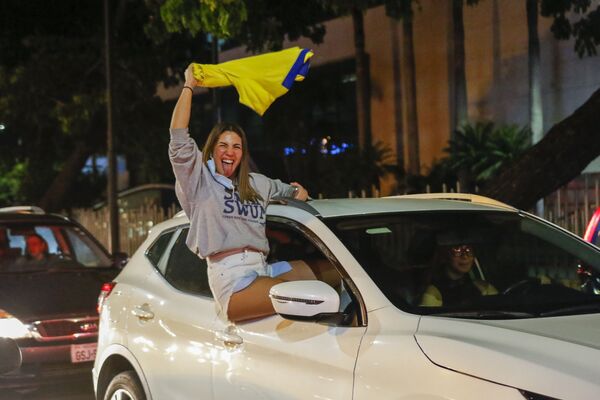 Simpatizantes de Guillermo Lasso (Ecuador) celebran en Guayaquil su victoria en las elecciones presidenciales. - Sputnik Mundo