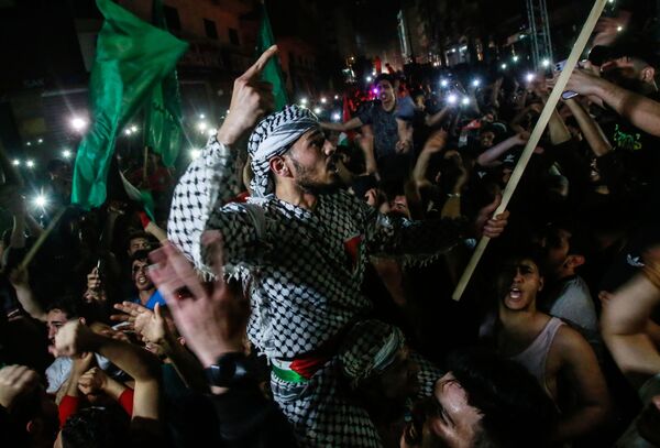 Los vecinos de la Franja de Gaza celebran la &quot;victoria de la resistencia&quot; en la batalla que Hamás bautizó como &#x27;Espada de Jerusalén&#x27;. - Sputnik Mundo