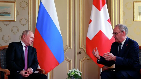 Reunión del presidente de Rusia, Vladímir Putin, y el presidente de Suiza, Guy Parmelin - Sputnik Mundo