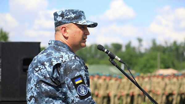 El contralmirante Oleksiy Neizhpapa, comandante de las Fuerzas Navales de Ucrania, habla durante la ceremonia de apertura del ejercicio marítimo multinacional Sea Breeze en Ucrania - Sputnik Mundo