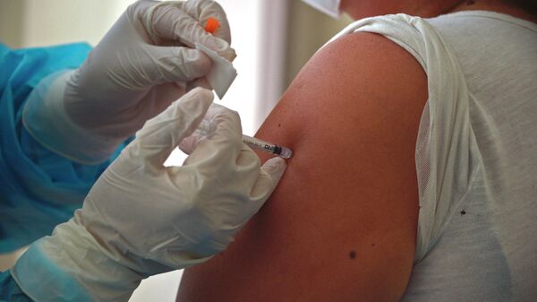 Vacunación contra COVID-19 en Quito, Ecuador - Sputnik Mundo