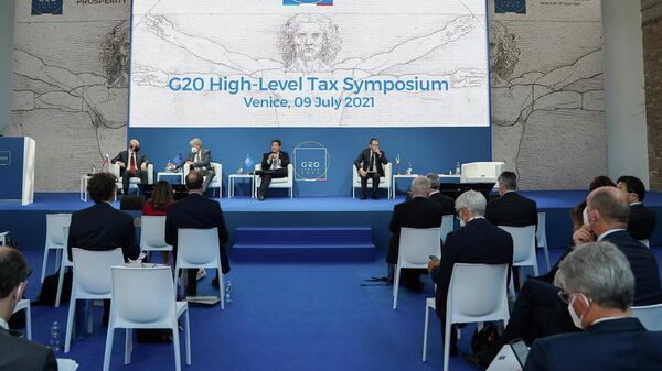Los participantes asisten al simposio fiscal de alto nivel del G20 durante la reunión de ministros de Finanzas y gobernadores de Bancos Centrales del G20 en Venecia, Italia, el 9 de julio de 2021 - Sputnik Mundo