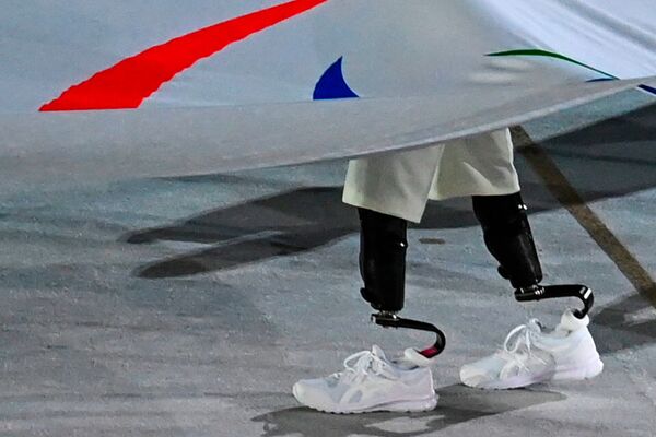 La bandera paralímpica en la ceremonia de inauguración de los Juegos Paralímpicos de Tokio. - Sputnik Mundo