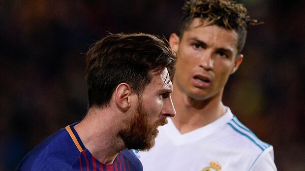 Lionel Messi y Cristiano Ronaldo - Sputnik Mundo