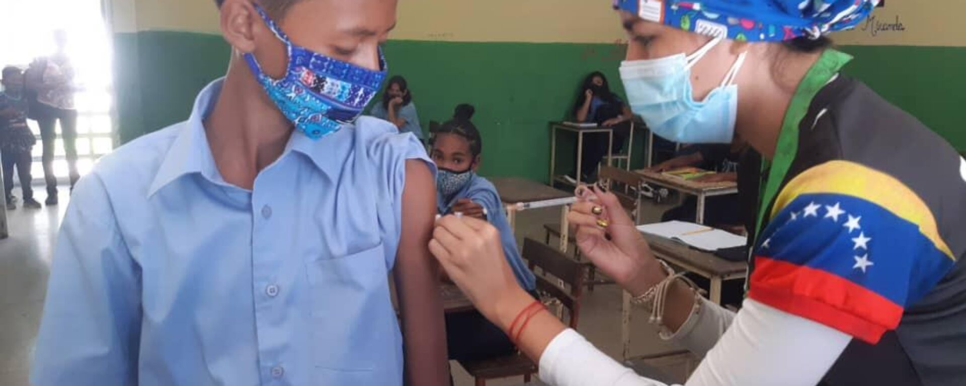Niños venezolanos reciben la primera dosis de la vacuna Sinopharm contra el COVID-19 - Sputnik Mundo, 1920, 04.01.2022