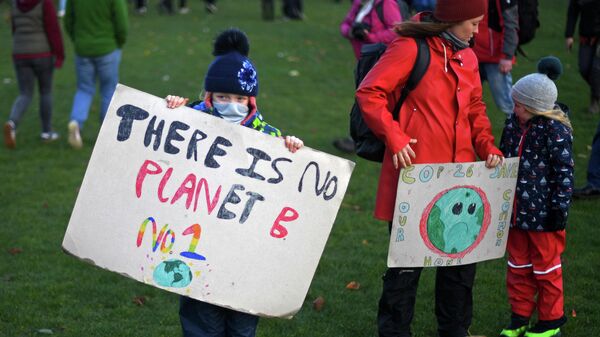 Una protesta contra la cumbre del clima en Glasgow a principios de noviembre de 2021 - Sputnik Mundo