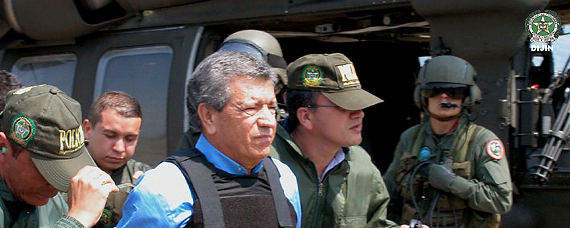 Miguel Rodríguez Orejuela, exfundador y líder del cartel de Medellín, escoltado para ser entregado a las autoridades estadounidenses el 11 de marzo de 2005 en la base aérea de Palanquero, cerca de Puerto, Colombia - Sputnik Mundo, 1920, 22.11.2021