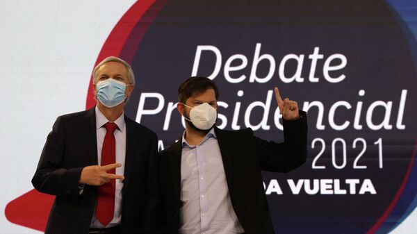 Candidatos presidenciales chilenos José Antonio Kast y Gabriel Boric - Sputnik Mundo