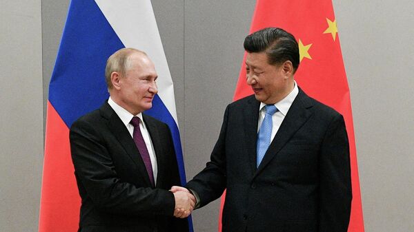 El presidente de Rusia y el presidente de China - Sputnik Mundo