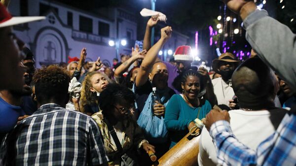 Con tambores, sanjuaneros veneran a su santo en Caracas en una vigilia de júbilo - Sputnik Mundo