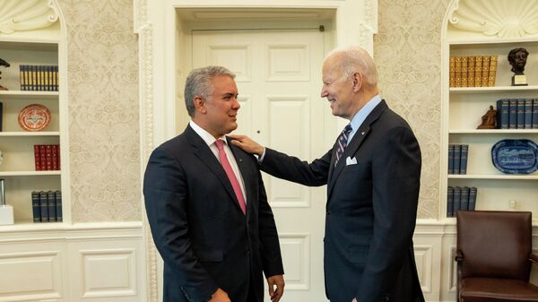 El presidente de Colombia, Iván Duque y su homólogo estadounidense, Joe Biden - Sputnik Mundo
