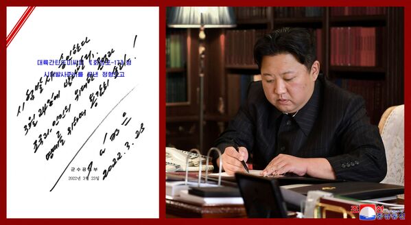 El lanzamiento tuvo lugar en Sunan, cerca de Pyongyang, a las 14:34 hora local, según informó la cúpula militar surcoreana. En la foto: Kim Jong-un firma una orden para poner a prueba el nuevo tipo de misil balístico intercontinental, Hwasong-17. - Sputnik Mundo
