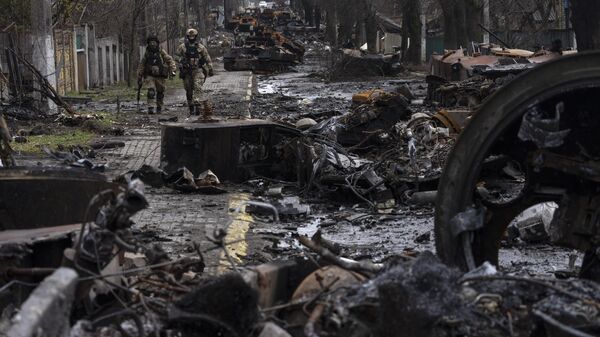 Soldados rusos en  Bucha, en las afueras de Kiev, Ucrania - Sputnik Mundo