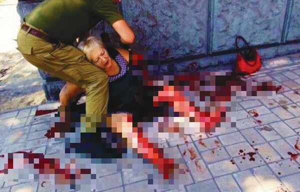 14 de agosto de 2014, Donetsk. Una anciana, otra víctima de un bombardeo de las FFAA de Ucrania. - Sputnik Mundo