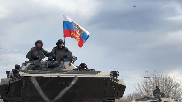 Militares rusos en la región de Járkov, Ucrania - Sputnik Mundo