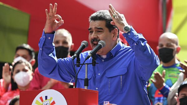 El presidente de Venezuela, Nicolás Maduro, acompañó la movilización de trabajadores por el centro de la capital - Sputnik Mundo