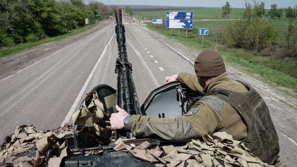 Un militar ucraniano - Sputnik Mundo
