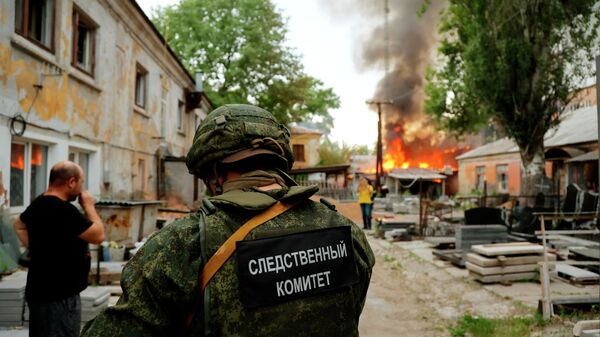 Consecuencias de un ataque de las fuerzas ucranianas contra la ciudad de Donetsk - Sputnik Mundo