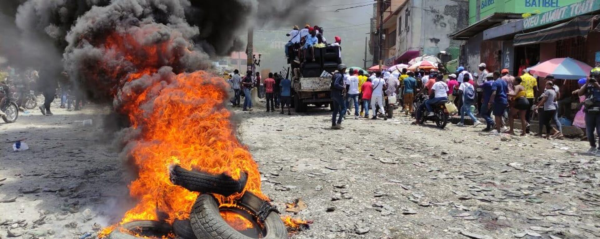 Manifestantes en Haití reclamando justicia por el expresidente asesinado Jovenel Moise  - Sputnik Mundo, 1920, 08.08.2022