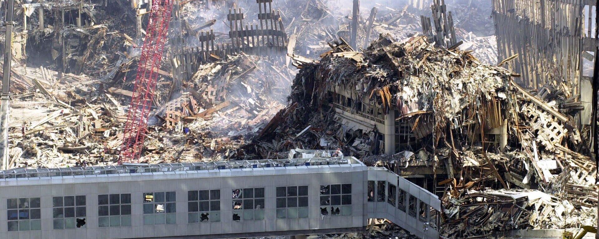 Вид сверху на разрушения после атаки на Всемирный торговый центр в США  - Sputnik Mundo, 1920, 11.09.2022