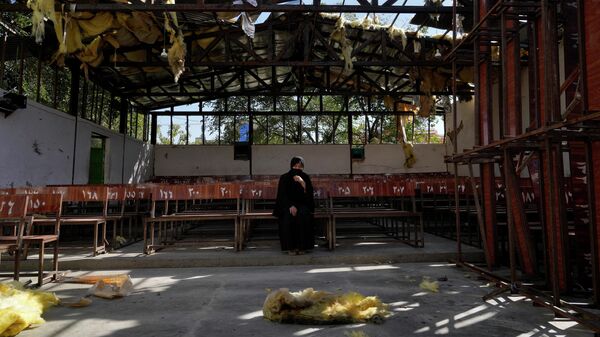 Consecuencias de la explosión en un colegio de Kabul, Afganistán - Sputnik Mundo