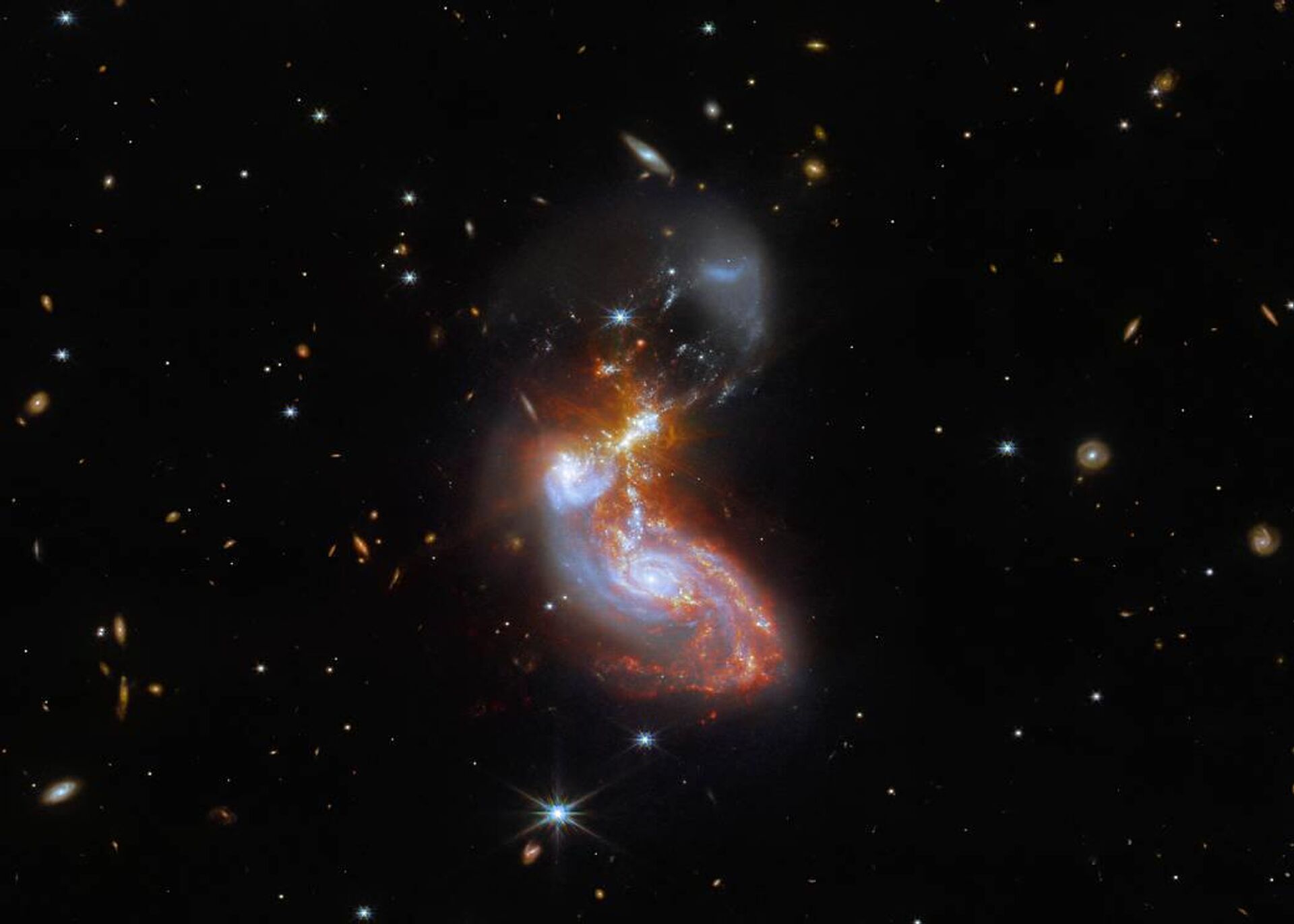 La fusión de 2 galaxias, captada por el telescopio espacial James Webb - Sputnik Mundo, 1920, 01.12.2022