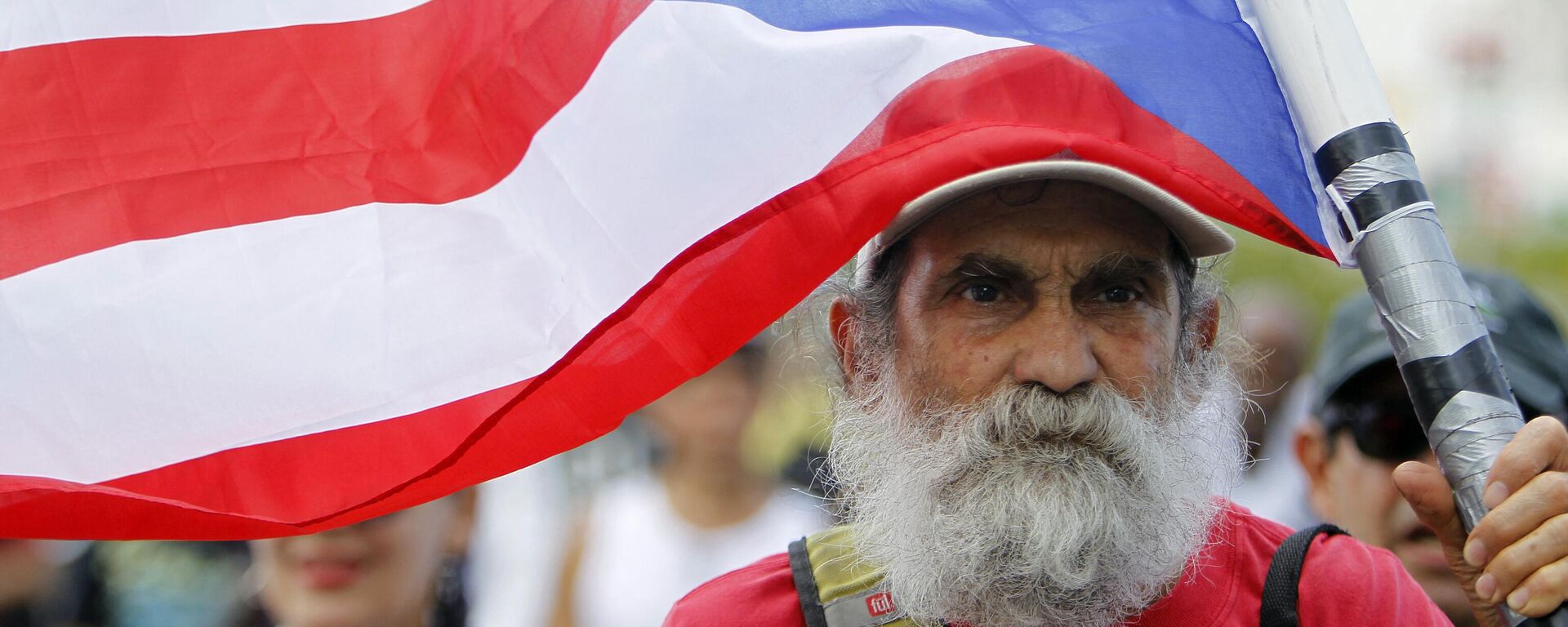 Ciudadano puertorriqueño durante una protesta en 2017. - Sputnik Mundo, 1920, 17.12.2022