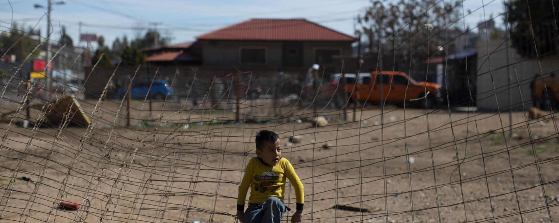 Juan Carlos, de 6 años, espera cruzar a EEUU mientras aguarda en un albergue en Nogales, Sonora. - Sputnik Mundo, 1920, 20.03.2023