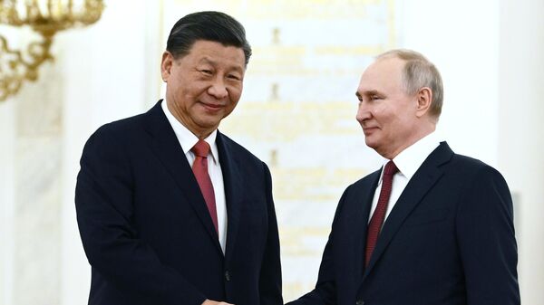 El presidente de China, Xi Jinping, y el presidente de Rusia, Vladímir Putin - Sputnik Mundo