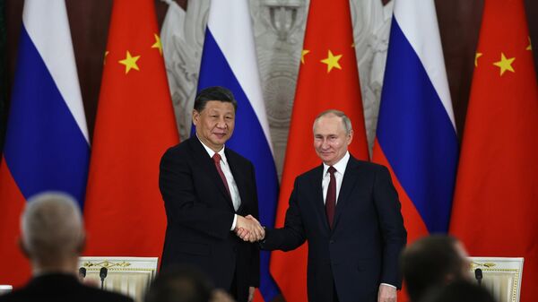 El presidente de China, Xi Jinping, y el presidente ruso, Vladímir Putin - Sputnik Mundo