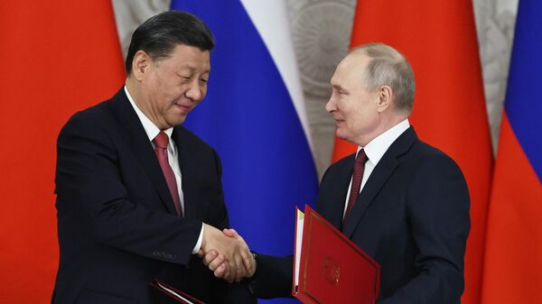 El presidente chino, Xi Jinping, y el presidente ruso Vladímir Putin - Sputnik Mundo