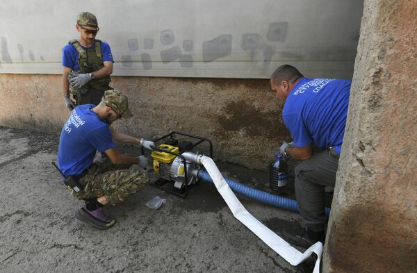 Bombeo de agua en la ciudad de Gólaya Pristan, región de Jersón. - Sputnik Mundo