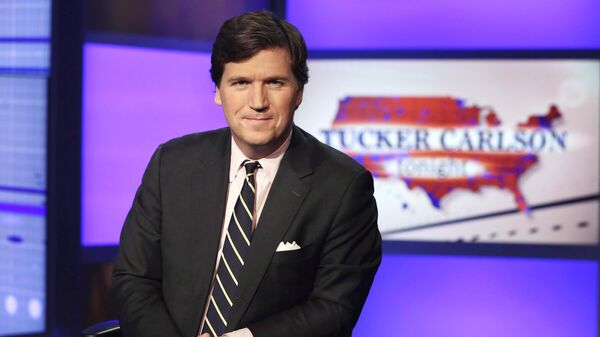 Tucker Carlson, expresentador de la cadena estadounidense Fox News - Sputnik Mundo
